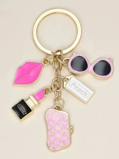LLavero diseño de labios, lentes, cartera y labial