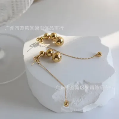Par de aretes de acero inoxidable para dama color dorado