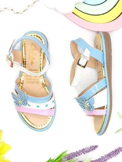 Sandalias colombianas para niña color celeste con diseño de mariposa C-10
