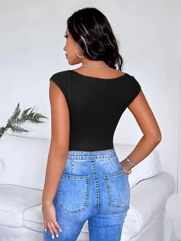 Body negro escote de corazon.