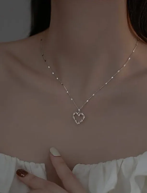 Collar, dije en forma de corazón