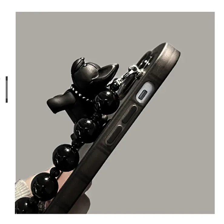 Funda para celular color negro con aza y diseño de perro