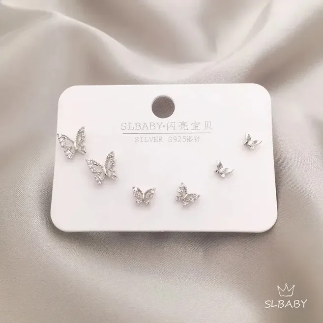 Set de aretes plata 925 con baño de oro diseño de mariposas