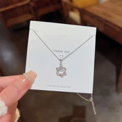 Collar de acero de titanio con dije de estrella