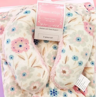 Conjunto de almohada y cobija con diseño floral multicolor