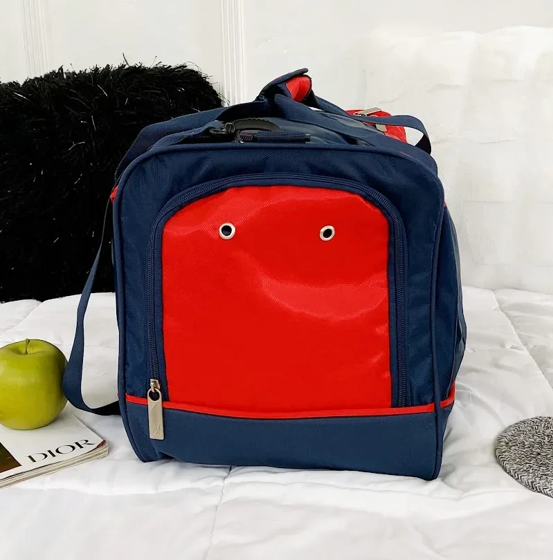 Bolso Nautica unisex color azul y rojo