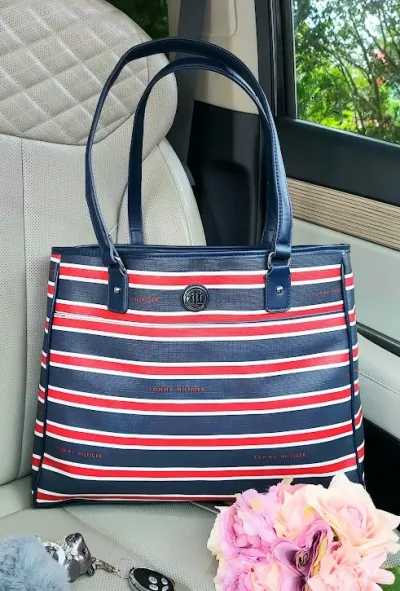 Bolso Tommy Hilfiger para dama diseño a rayas multicolor