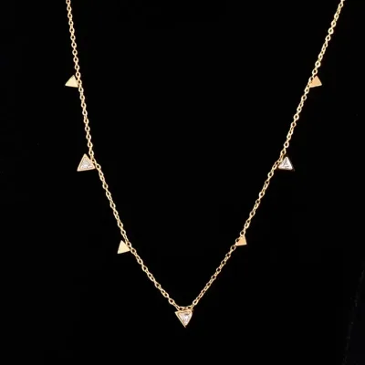 Collar para dama con incrustaciones de oro y acero de titanio, con diseño de triángulos
