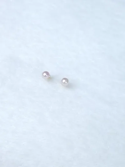 Par de aretes para dama diseño de bolita rosa