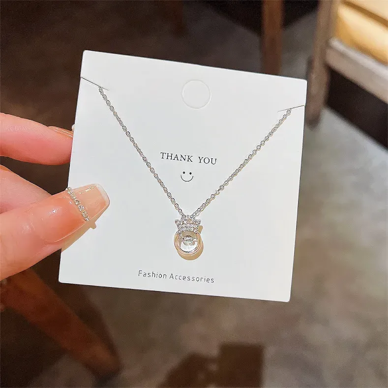 Collar de acero de titanio con dije de corona