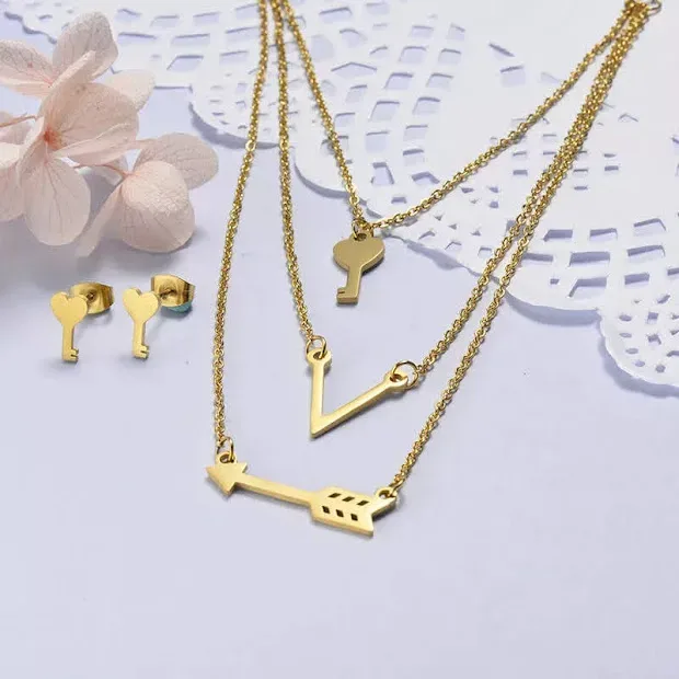 Conjunto de acero inoxidable para dama color dorado