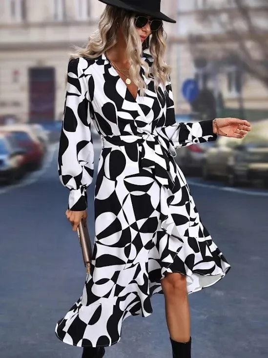Vestido para dama color blanco y negro cruzado con estampado geométrico de manga obispo con cinturón