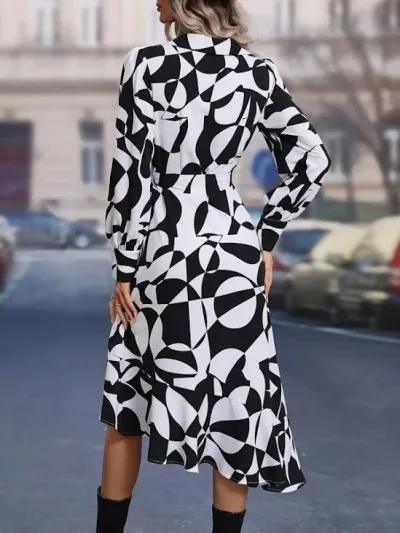 Vestido para dama color blanco y negro cruzado con estampado geométrico de manga obispo con cinturón