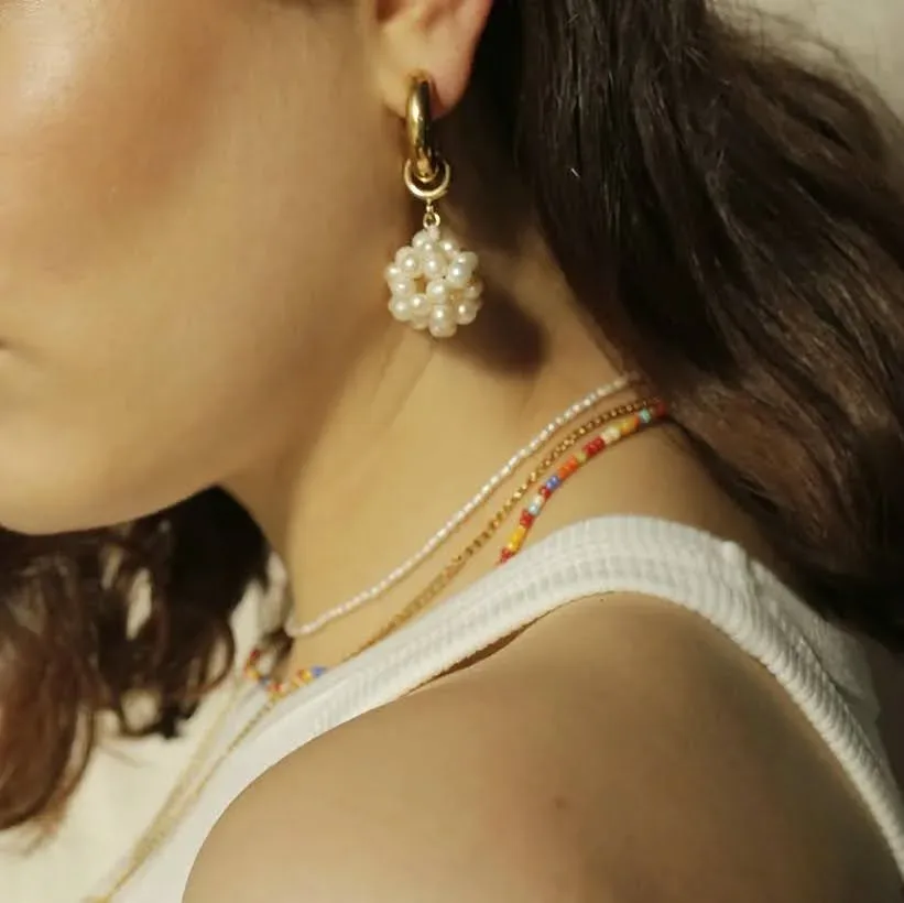 Par de argollas de acero inoxidable para dama color dorado y blanco