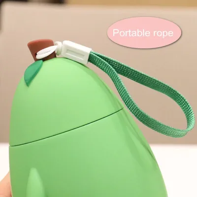 Botella de agua de cristal en forma aguacate con carita sonriente ojos chinos