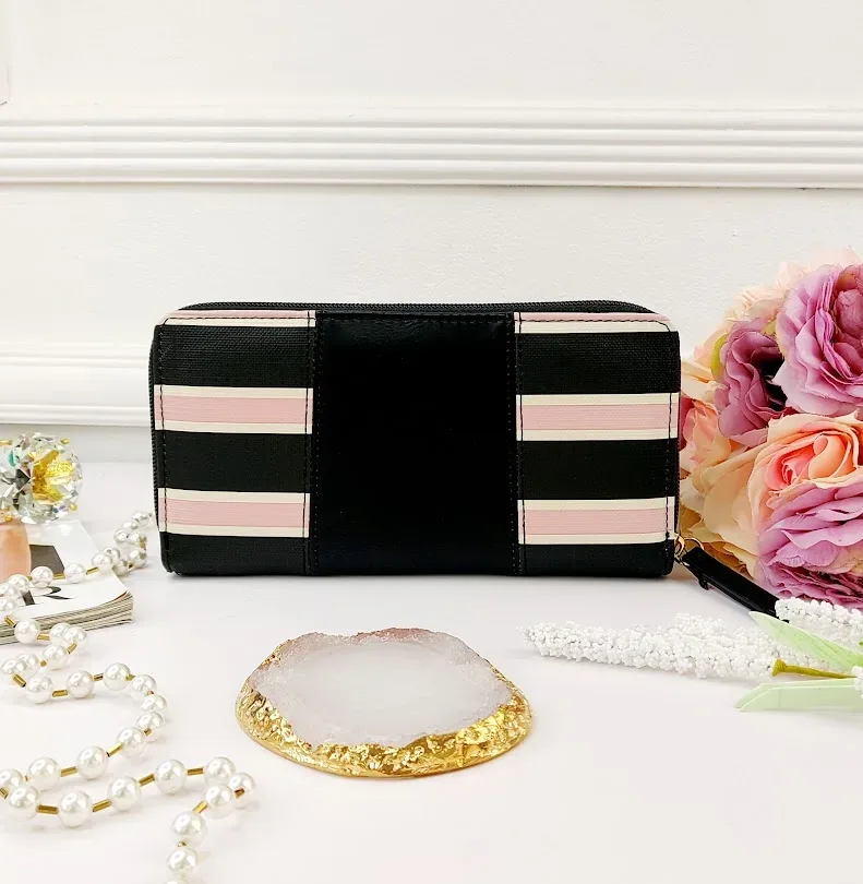 Cartera Tommy Hilfiger para dama diseño a rayas