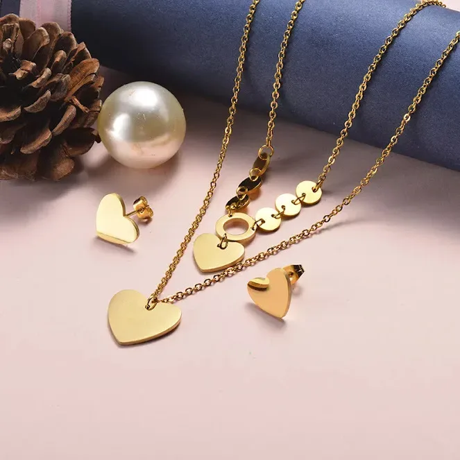 Conjunto de acero inoxidable para dama color dorado