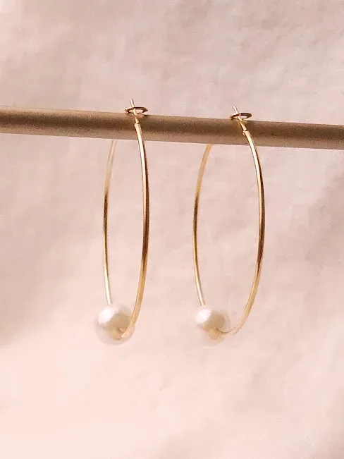 Argollas para dama de fantasía con detalle de perla