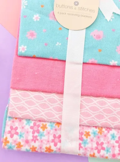 Conjunto de 4 franelas para niña tonos rosa y celeste