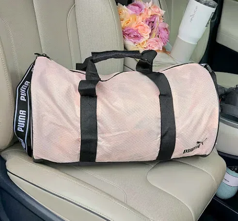 Bolso Puma para dama color rosa y negro