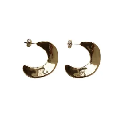 Par de aretes de titanio de titanio para dama color dorado