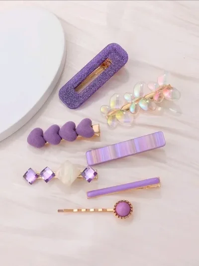 Set de prensas de cabello para dama diseño varios color morado y dorado