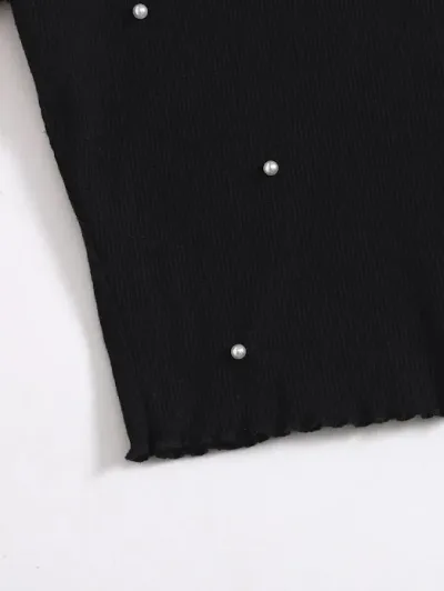 Blusa para dama color negro y diseño de perlas