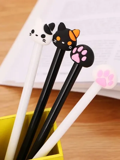 Par de plumas con diseño de gatos al azar