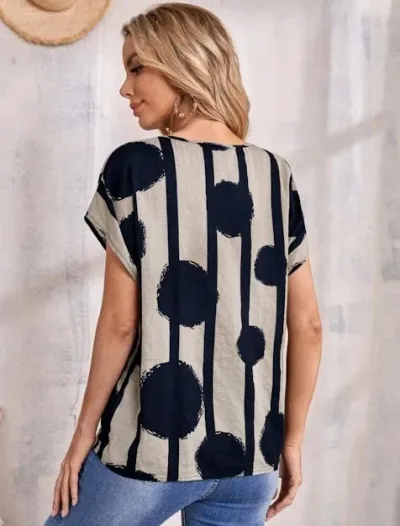 Blusa para dama con puntos y rayas en color negro