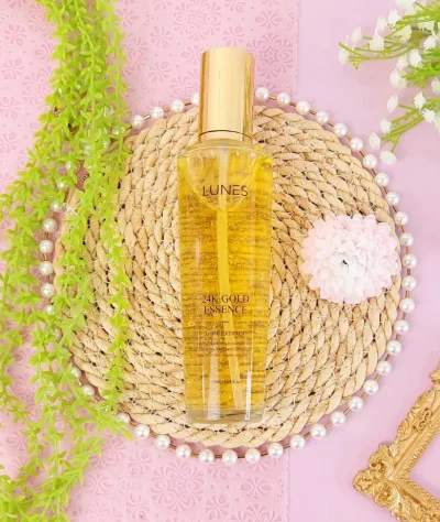 Serum Lunes oro 24K con extracto de hierbas para dama color dorado
