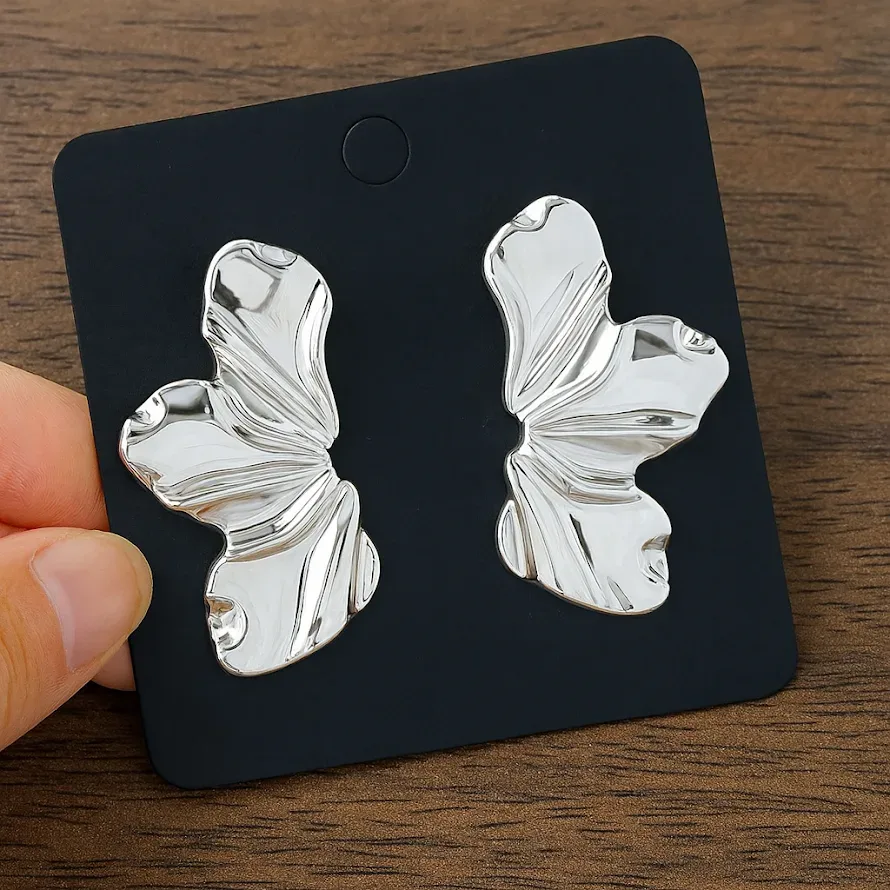 Aretes dama- Mitad flor / Plateados