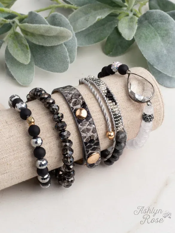Pulseras fantasía color negro con plateado varias