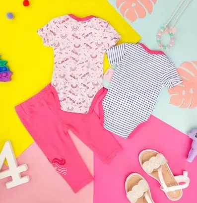 Conjunto para niña en tonos rosados
