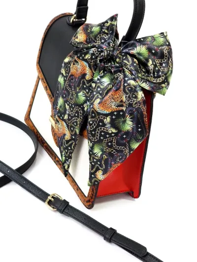 Bolso ALDO color beige con animal print