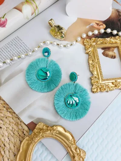Aretes para dama de fantasía con forma circular color turqueza