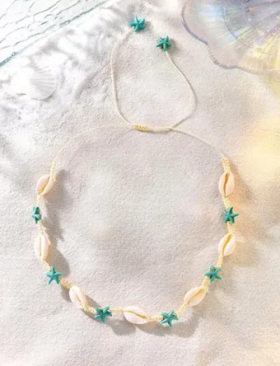 Collar con concha y estrella de mar