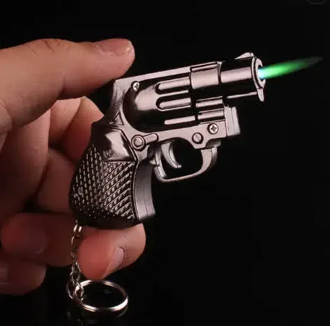 Encendedor con pistola y accesorio para poner en llaves