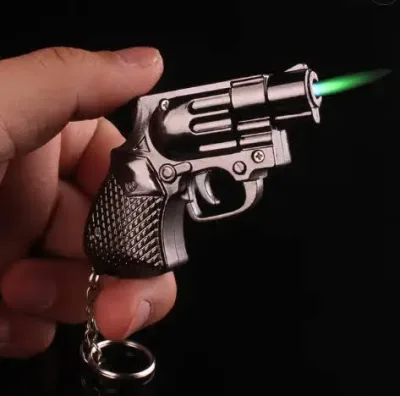 Encendedor con pistola y accesorio para poner en llaves