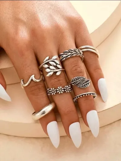 Set de anillos de fantasía para dama color plateado