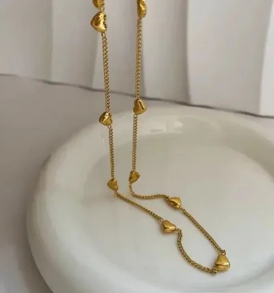 Collar de acero de titanio con baño oro