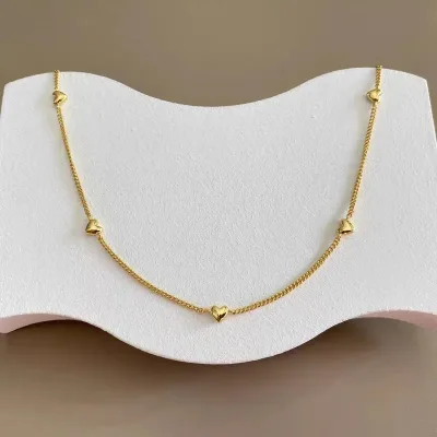 Collar de acero de titanio con baño oro