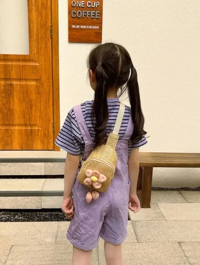 Bolso trenzado de flor para niña