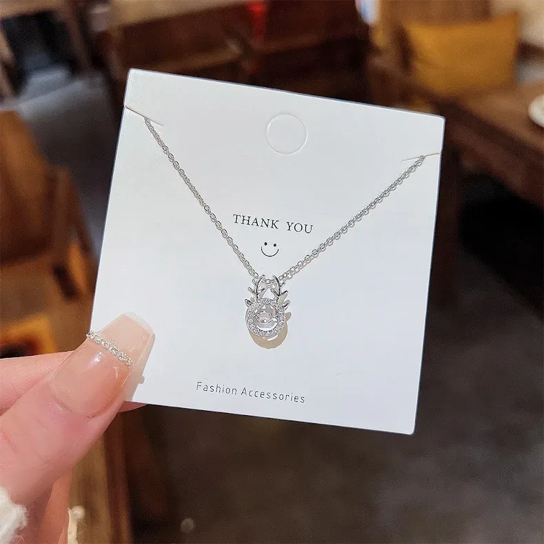 Collar de acero de titanio con dije de venado