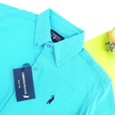 Camiseta Cambrige Polo Club para niño color celeste.