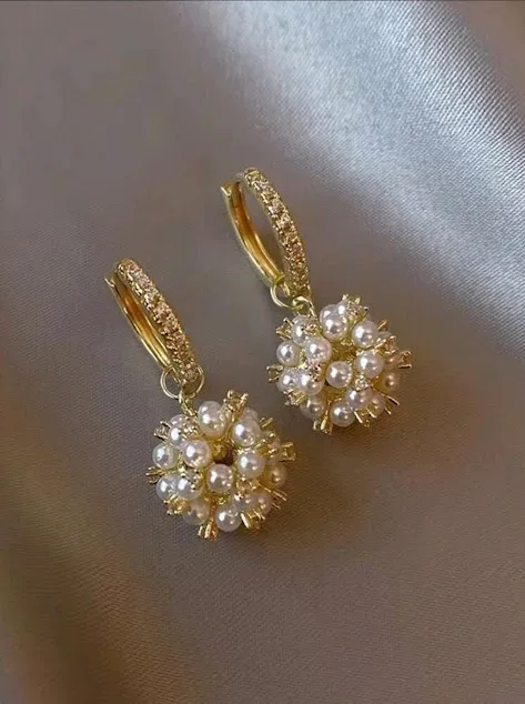 Argollas de acero inoxidable  para dama color dorado