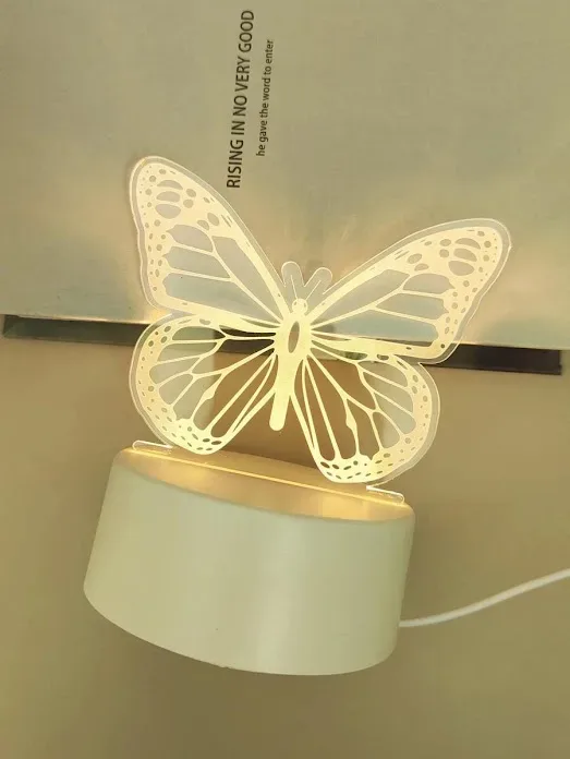 Luz con diseño de mariposa