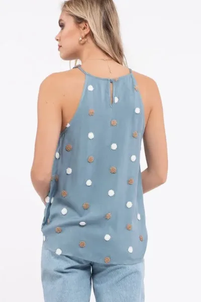 Blusa para dama con puntos en relieve estilo bordados