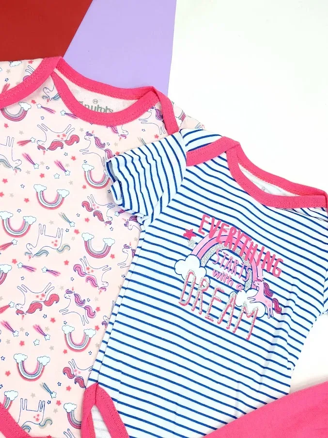 Conjunto para niña en tonos rosados