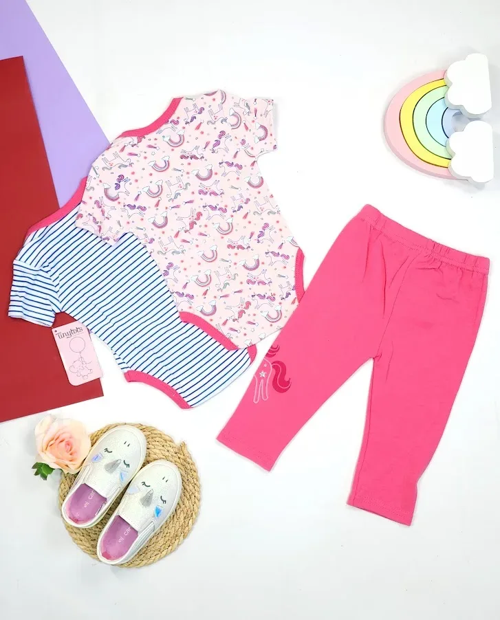Conjunto para niña en tonos rosados