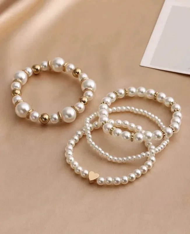 Pulsera con diseño de corazón y perla